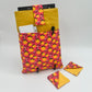 Book Sleeve with 2 Fabric Bookmarks in Coral Oranges
