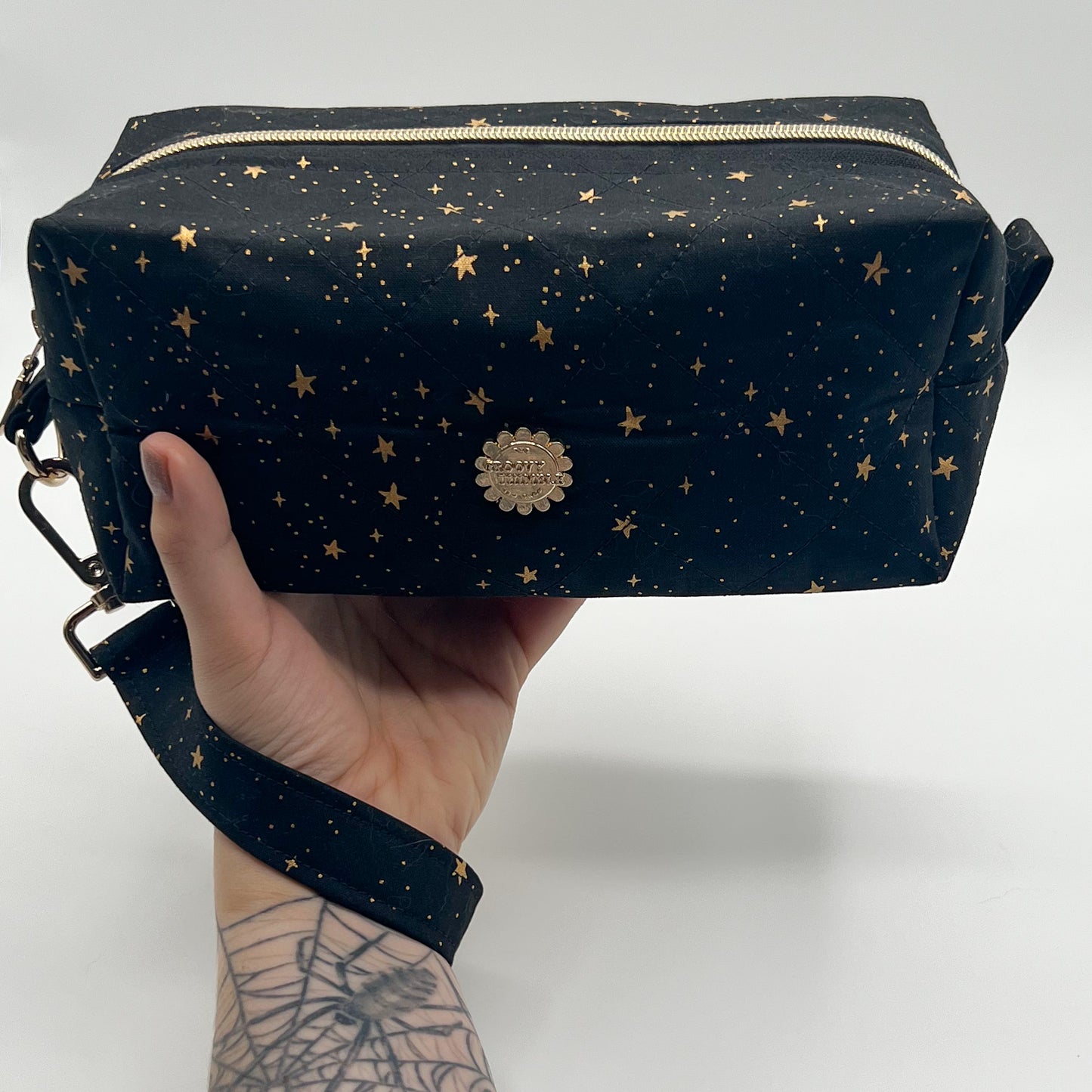 Large Quilted Makeup Bag in Metallic Stars
