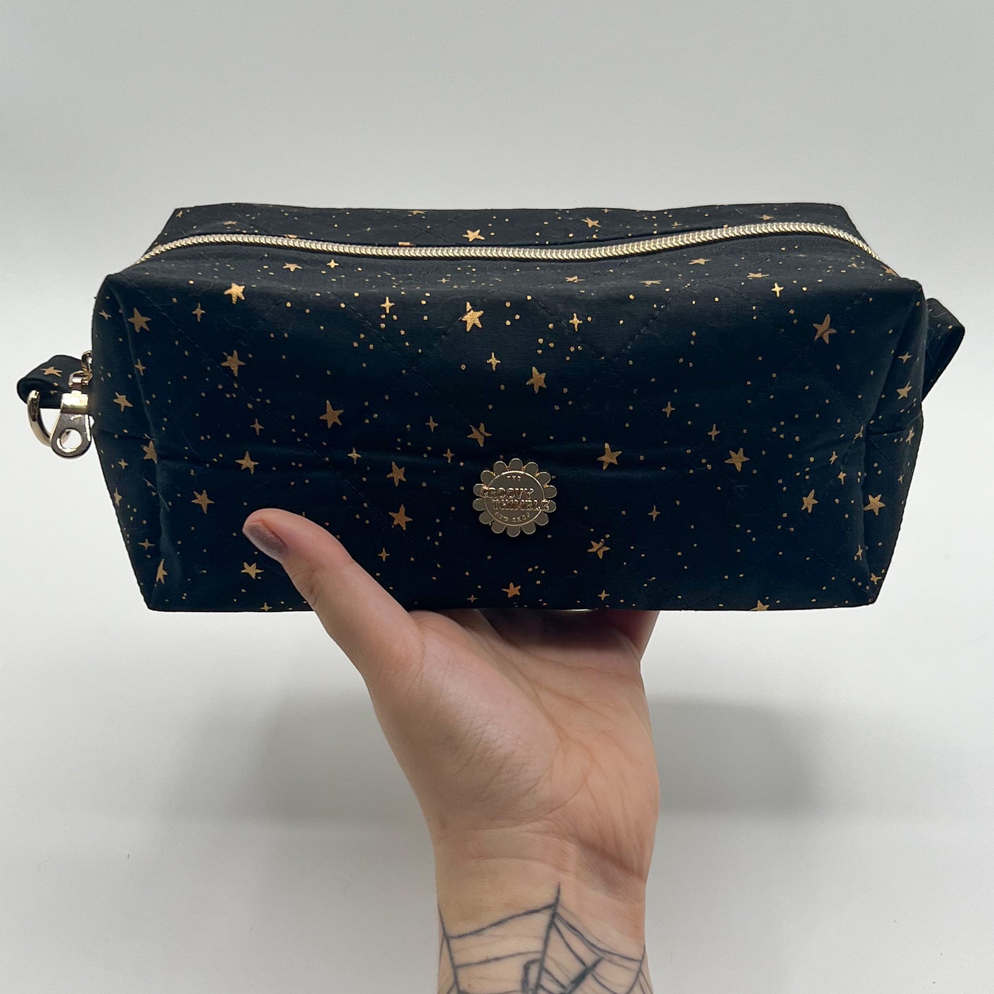 Large Quilted Makeup Bag in Metallic Stars